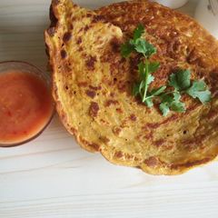 A picture of Moong and cherra pitha.