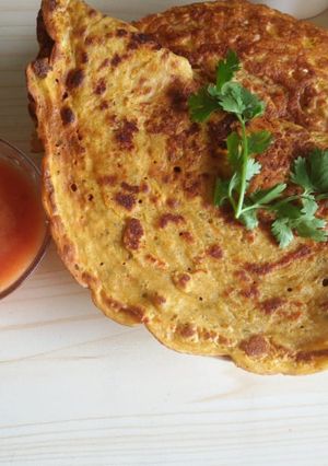 A picture of Moong and cherra pitha.