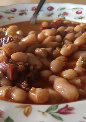A picture of Stew of Canned White Beans with Chorizo and Ham.