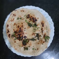 A picture of Butter Naan (Wheat Flour).