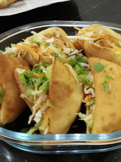 A picture of Johnny one one(mandazi and samosa).