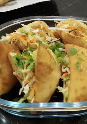 A picture of Johnny one one(mandazi and samosa).