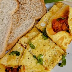A picture of Masala Cheesy Egg Omelette.