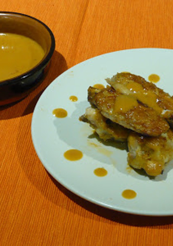Una foto de Alas de pollo asadas con mostaza y miel