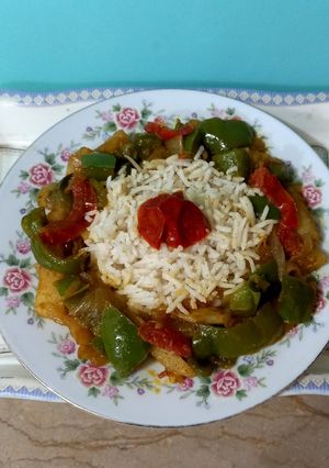 A picture of Mixed vegetables with boiled rice.