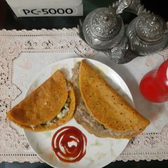 A picture of Stuffed besan chilla.