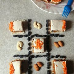 A picture of Vegan Carrot cake with Cashew cream frosting.