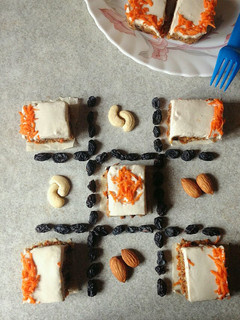 A picture of Vegan Carrot cake with Cashew cream frosting.