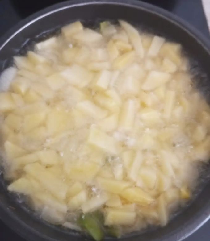 Foto principal de Tortilla de patatas con cebolla y pimiento