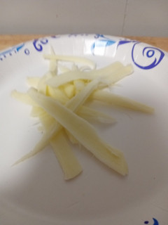 A picture of String cheese slices.