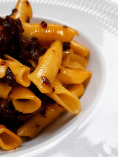 Una foto de Garganelli a la carbonara de chorizo criollo
