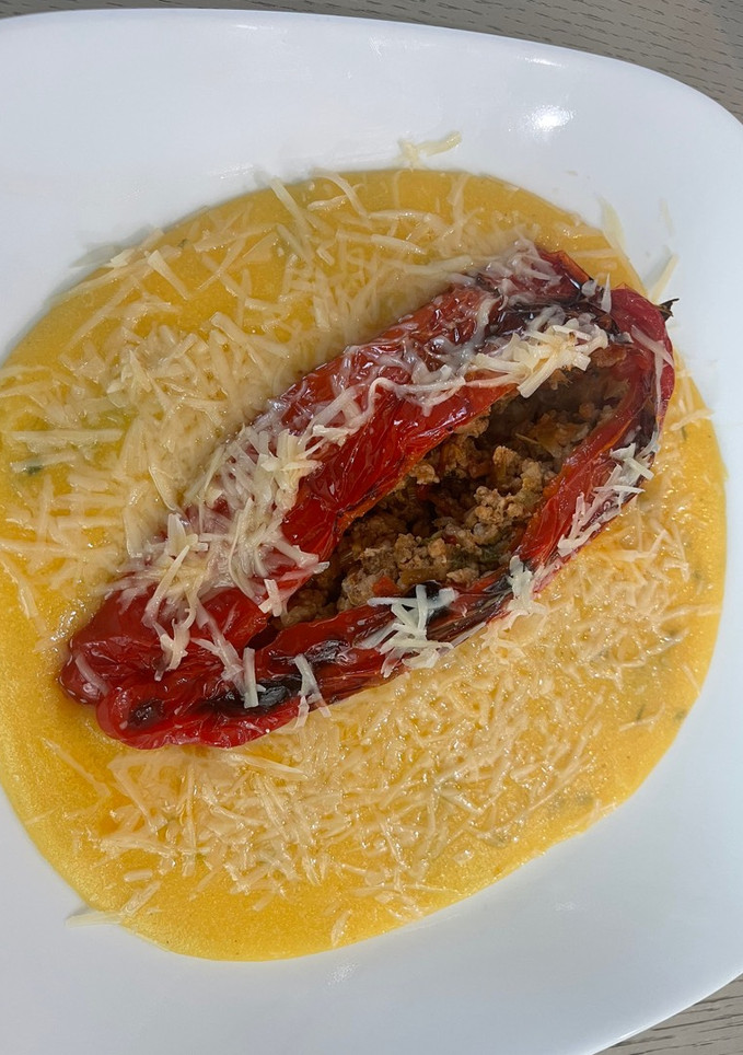 Una foto de Pimientos morrones rellenos