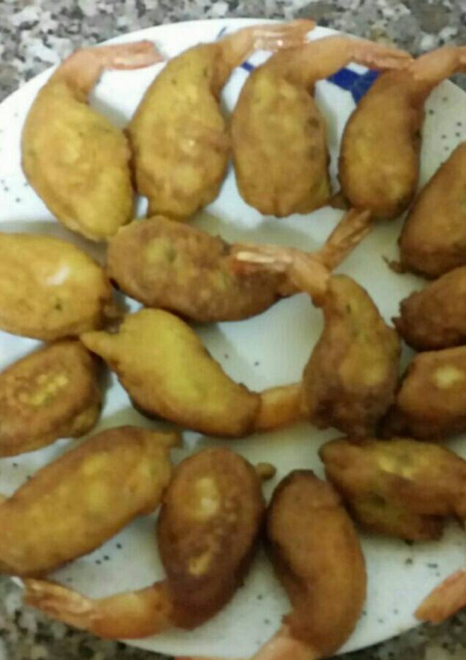 Una foto de Gambas con gabardina