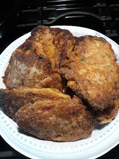 A picture of Cornbread with Ham, Onions and Tomatoes.