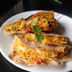 A picture of Cheese desi tacos.