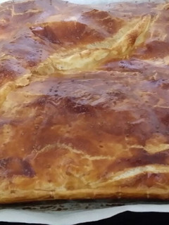 Una foto de Empanada de jamón y queso