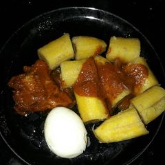 Boiled plantains and egg turkey stew A picture of Boiled plantains and egg turkey stew.