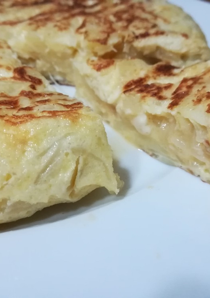 Una foto de Tortilla de patatas con cebolla al microondas