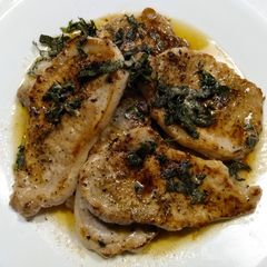 A picture of Pork Chops with Crispy Herbs.