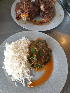 A picture of Tomato Stew infused with green vegetables.