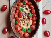Una foto de provoleta tomate