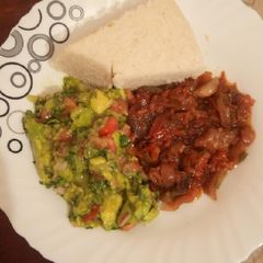 A picture of Wet fry beef, guacamole and ugali.