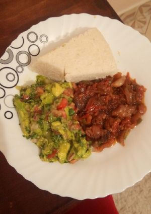 A picture of Wet fry beef, guacamole and ugali.