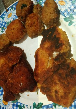 Una foto de Milanesas de bagre y albahaca