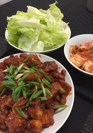 A picture of Pork belly in spicy korean sauce.