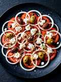Insalata di Cuore di Bue con Primo Sale e Olive Taggiasche Origano Emulsione di Aceto Balsamico
