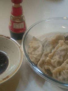 A picture of Asian Dumplings, boiled.