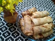 Una foto de crepas relleno de queso ricotta