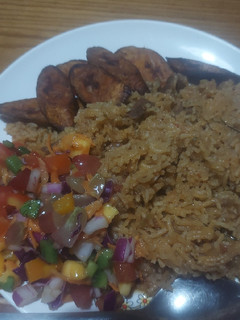 A picture of Pilau Plantain and Salad with Japanese Vinegrette.