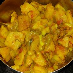 A picture of Aloo and green lehsun sabji.