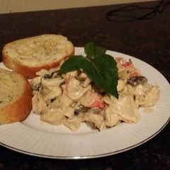 A picture of Brad's seafood tortillini in white wine alfredo.