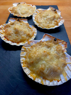Una foto de Vieiras gratinadas