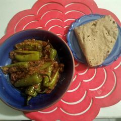 A picture of Mircho ka salan with roti.