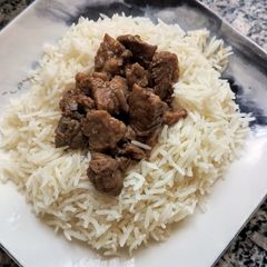 A picture of Rice with Dry Fry Beef.