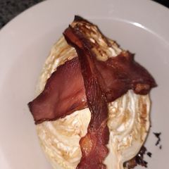 A picture of Baked cabbage and bacon.