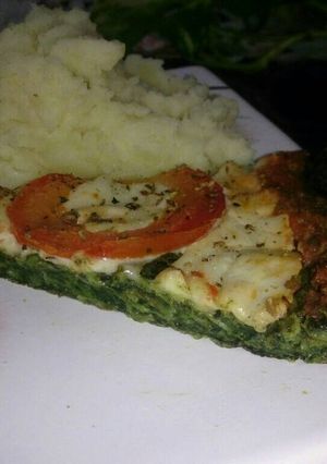 Una foto de Pizza🍕con base de espinaca