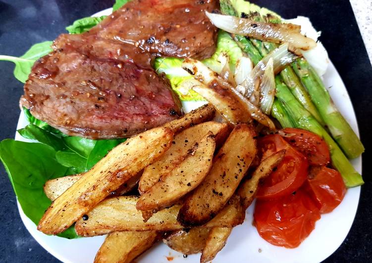 My Peppered Marinated Steak with Onions garlic, Wedge Chips. π