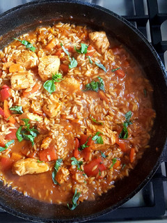 Una foto de Arroz caldoso, mi versión