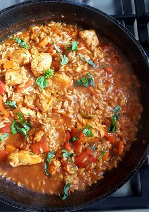 Una foto de Arroz caldoso, mi versión