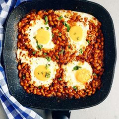 A picture of Spicy baked beans and eggs.