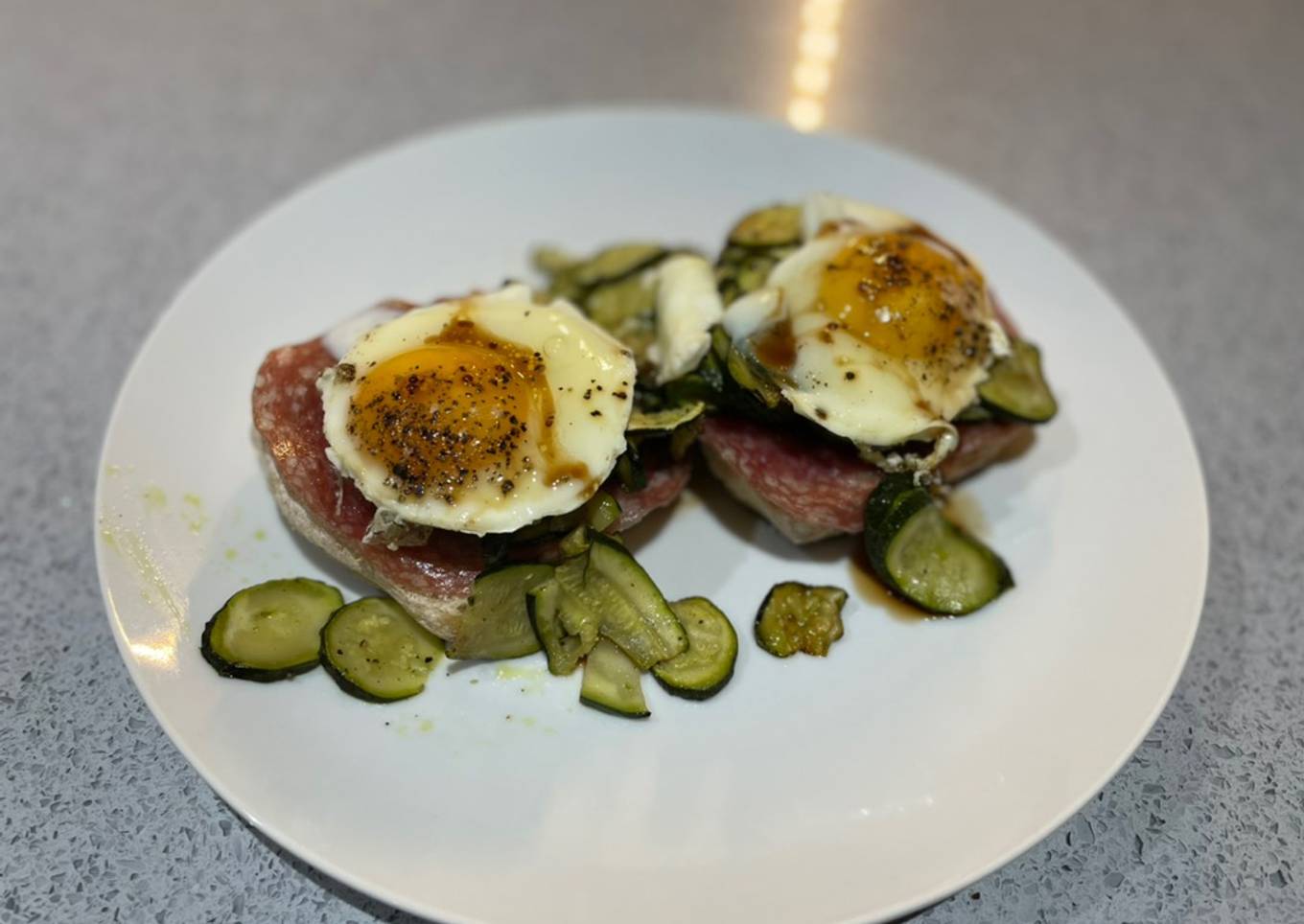 Warm green salad and poached egg