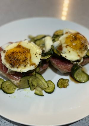 A picture of Warm green salad and poached egg.