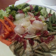 A picture of Steamed vegetables with crispy Iberian ham.