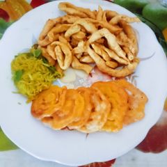 A picture of Gathiya with jalebi & papaya sambara for Dussehra.
