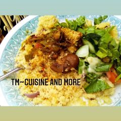 A picture of Cuscuss and chicken Sauce.