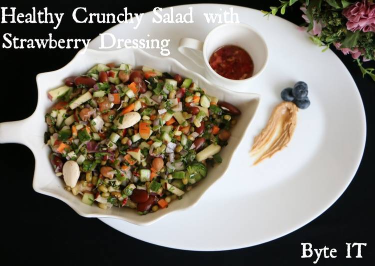 Healthy crunchy salad with strawberry dressing